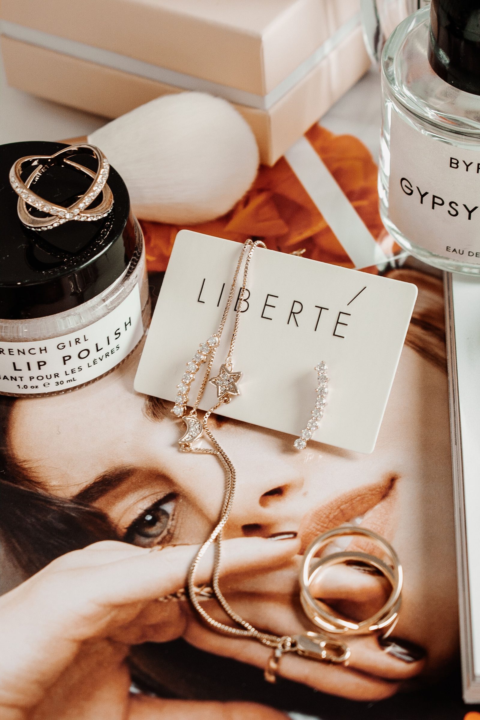 Fashion jewelry styled with beauty products